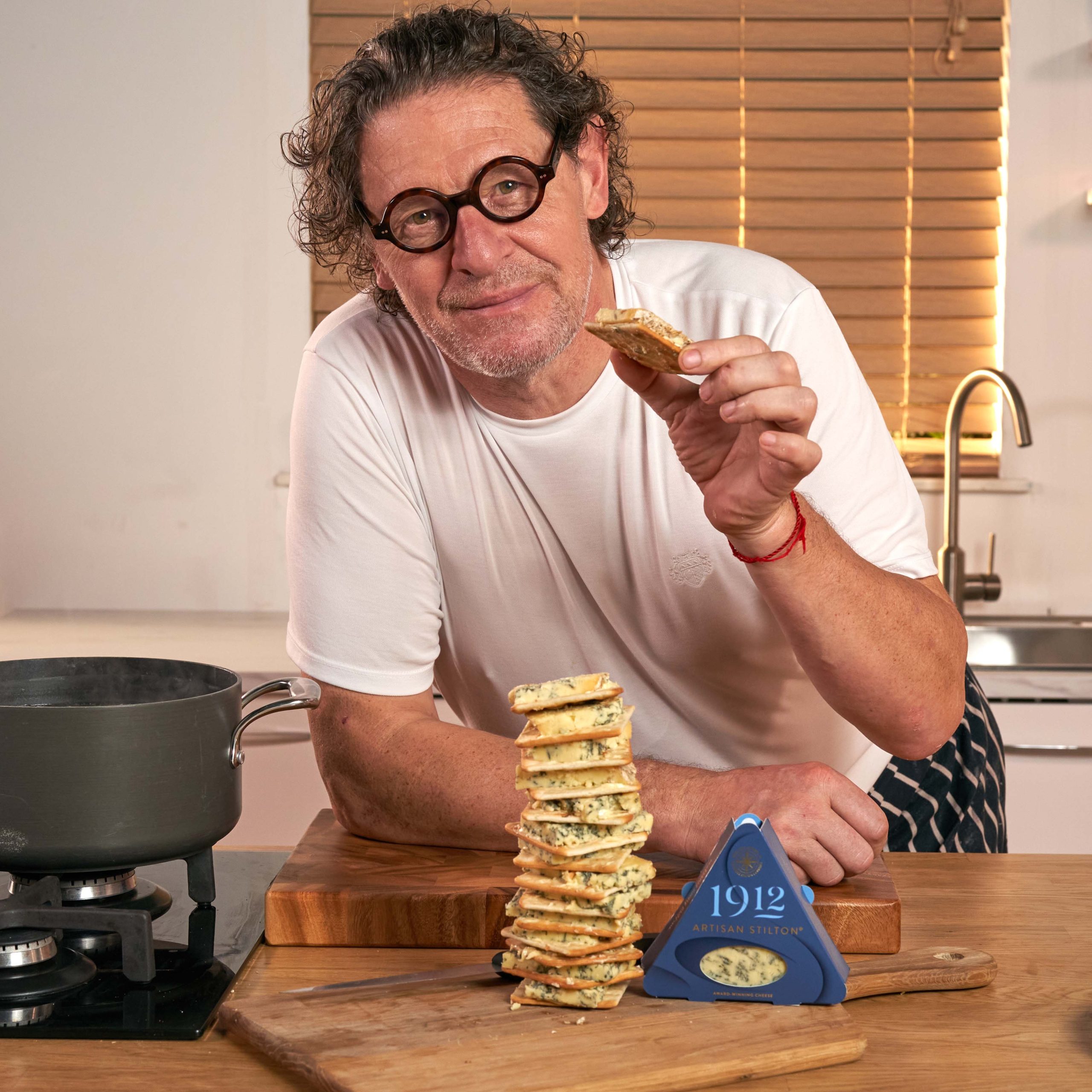 Marco Pierre White showing off a 1912 Stilton and cream cracker tower.